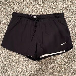 Nike athletic shorts, black and white size L